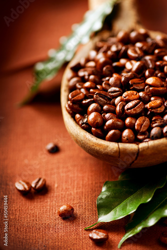 Photo: Coffee beans. Bowl of Aromatic Coffee close-up Coffee beans. Bowl of Aromatic Coffee close-up