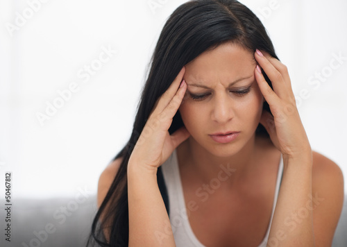 Photo: Portrait of stressed young woman Portrait of stressed young woman