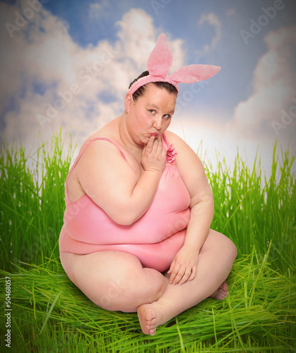 Photo: Funny woman with rabbit ears. Funny woman with rabbit ears.