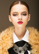 Glamour. Honorable Fashionable Woman in  Rufous Fur Collar