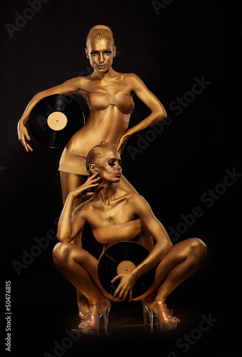Photo: Bodyart. Golden Women - Vinyl Records. Creative Concept Bodyart. Golden Women - Vinyl Records. Creative Concept