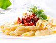 Photo: Pasta Penne with Bolognese Sauce, Basil and Parmesan Pasta Penne with Bolognese Sauce, Basil and Parmesan