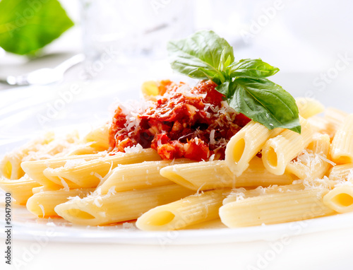 Photo: Pasta Penne with Bolognese Sauce, Basil and Parmesan Pasta Penne with Bolognese Sauce, Basil and Parmesan