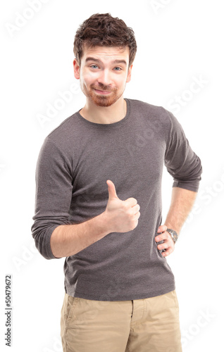 Photo: Happy man with thumbs up gesture, isolated on white Happy man with thumbs up gesture, isolated on white