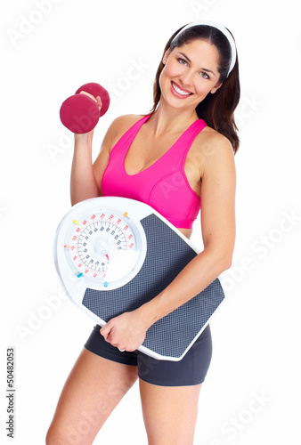 Photo: Young beautiful fitness woman. Young beautiful fitness woman.
