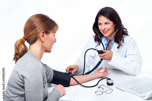 Photo: Doctor woman and patient. Doctor woman and patient.