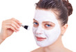 Beauty woman getting facial mask isolated