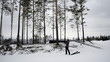 Young woman photographed in the winter woods