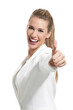 young beautiful woman with thumbs up on white