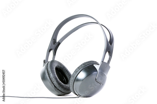 Photo: Big black headphones isolated over white Big black headphones isolated over white