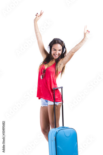Photo: Happy woman going on vacation Happy woman going on vacation