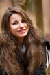 Photo: Happy girl smiling outdoors Happy girl smiling outdoors