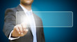 Businessman touching digital screen.
