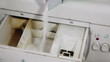 Video: Pouring laundromat with washing powder Pouring laundromat with washing powder