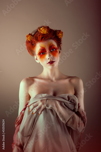 Photo: Unusual Redhead Woman with False Red Eyelashes. Fantasy Unusual Redhead Woman with False Red Eyelashes. Fantasy