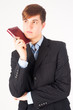 Photo: businessman holding diary log businessman holding diary log