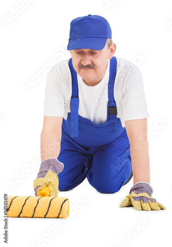 Photo: house painter is painting floor house painter is painting floor