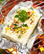 Grilling halloumi on a barbecue