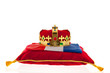 Golden crown on velvet pillow with Dutch flag