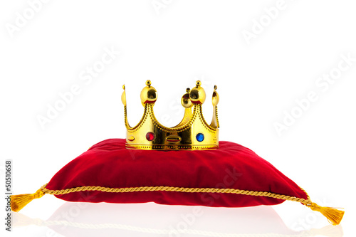 Photo: Golden crown on velvet pillow Golden crown on velvet pillow