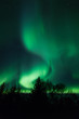 Northern lights above lagoon in Iceland