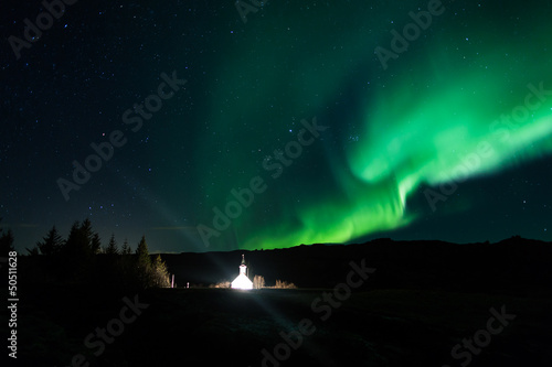 Photo: Northern lights above a church in Iceland Northern lights above a church in Iceland