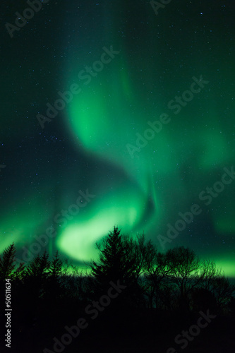 Photo: Northern lights above lagoon in Iceland Northern lights above lagoon in Iceland