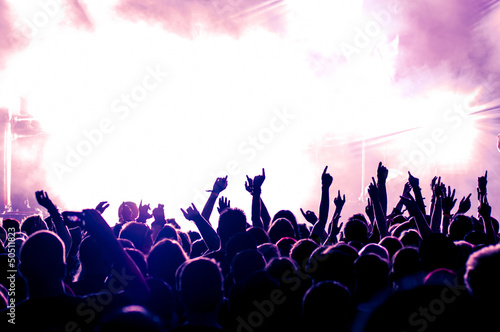 Photo: cheering crowd at concert cheering crowd at concert