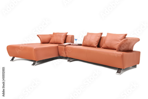 Photo: Studio shot of a luxury brown leather sofa Studio shot of a luxury brown leather sofa