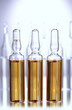 medical ampules on grey background