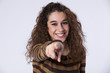 Young woman pointing