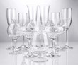 Cocktail and wine glasses, on gray background