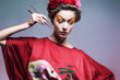 Fashion asian woman wearing traditional japanese red kimono  wit