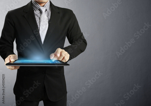 Photo: touch screen ,touch- tablet in hands touch screen ,touch- tablet in hands