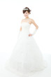 Beautiful asian woman dressed as a bride on white background