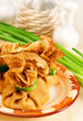 Foto: Russian traditional pancakes with eggs and spring onions Russian traditional pancakes with eggs and spring onions