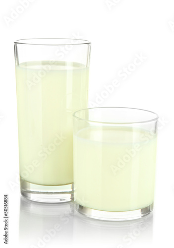 Photo: Two glass of milk isolated on white Two glass of milk isolated on white