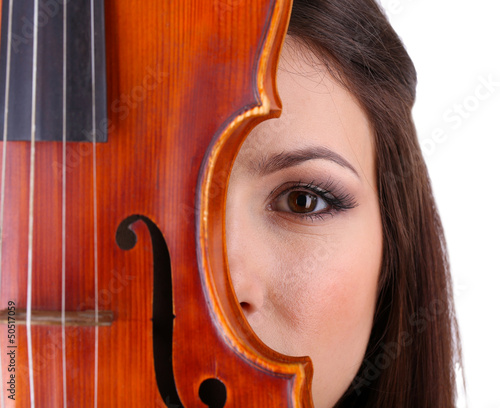 Photo: Beautiful young girl with violin, isolated on white Beautiful young girl with violin, isolated on white