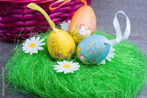 Photo: Easter eggs with basket Easter eggs with basket