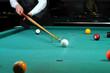 person playing snooker in a club