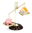 Piggy bank and house on bowls of scales