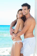 Happy Young Couple At Beach
