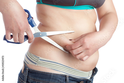 Photo: Fat woman trying to get rid of excess fat and completeness. Fat woman trying to get rid of excess fat and completeness.