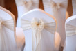 Foto: Wedding Seating Decorated with Peach Bows Wedding Seating Decorated with Peach Bows