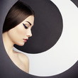 Conceptual fashion portrait of a beautiful young woman
