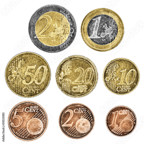 Photo: A set of well worn Euro coins on a white background A set of well worn Euro coins on a white background