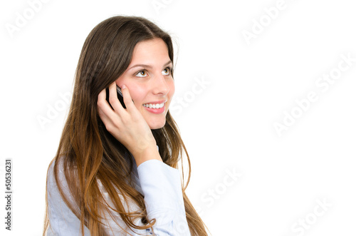 Photo: junge frau telefoniert mit ihrem handy junge frau telefoniert mit ihrem handy