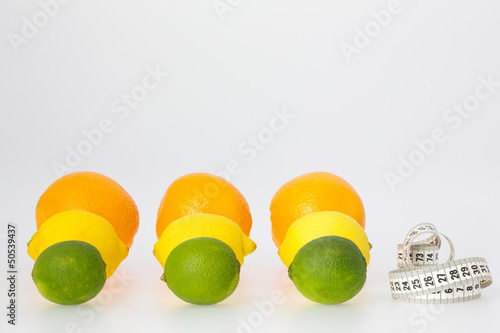 Photo: Citrus Fruits and Measuring Tape Citrus Fruits and Measuring Tape