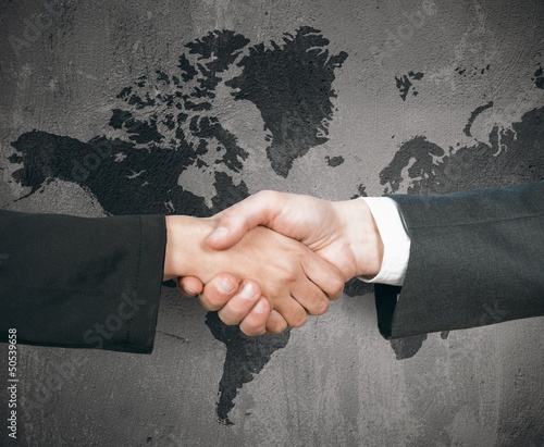 Photo: Business world handshake Business world handshake