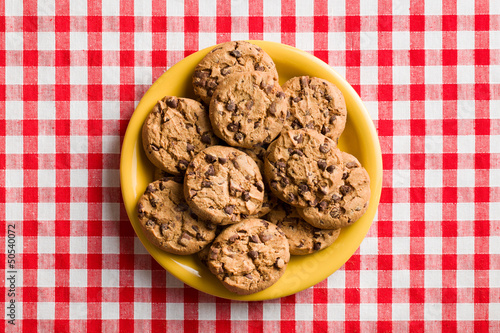 Photo: chocolate cookies on checkered tablecloth chocolate cookies on checkered tablecloth
